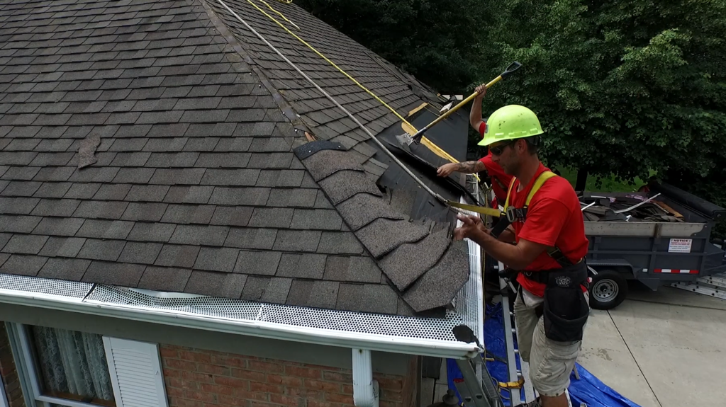 3 Middle Creek Roofing professionals performing a roof repair service