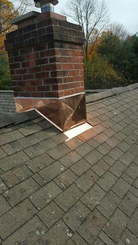 Copper chimney flashing installed courtesy of Middle Creek Roofing
