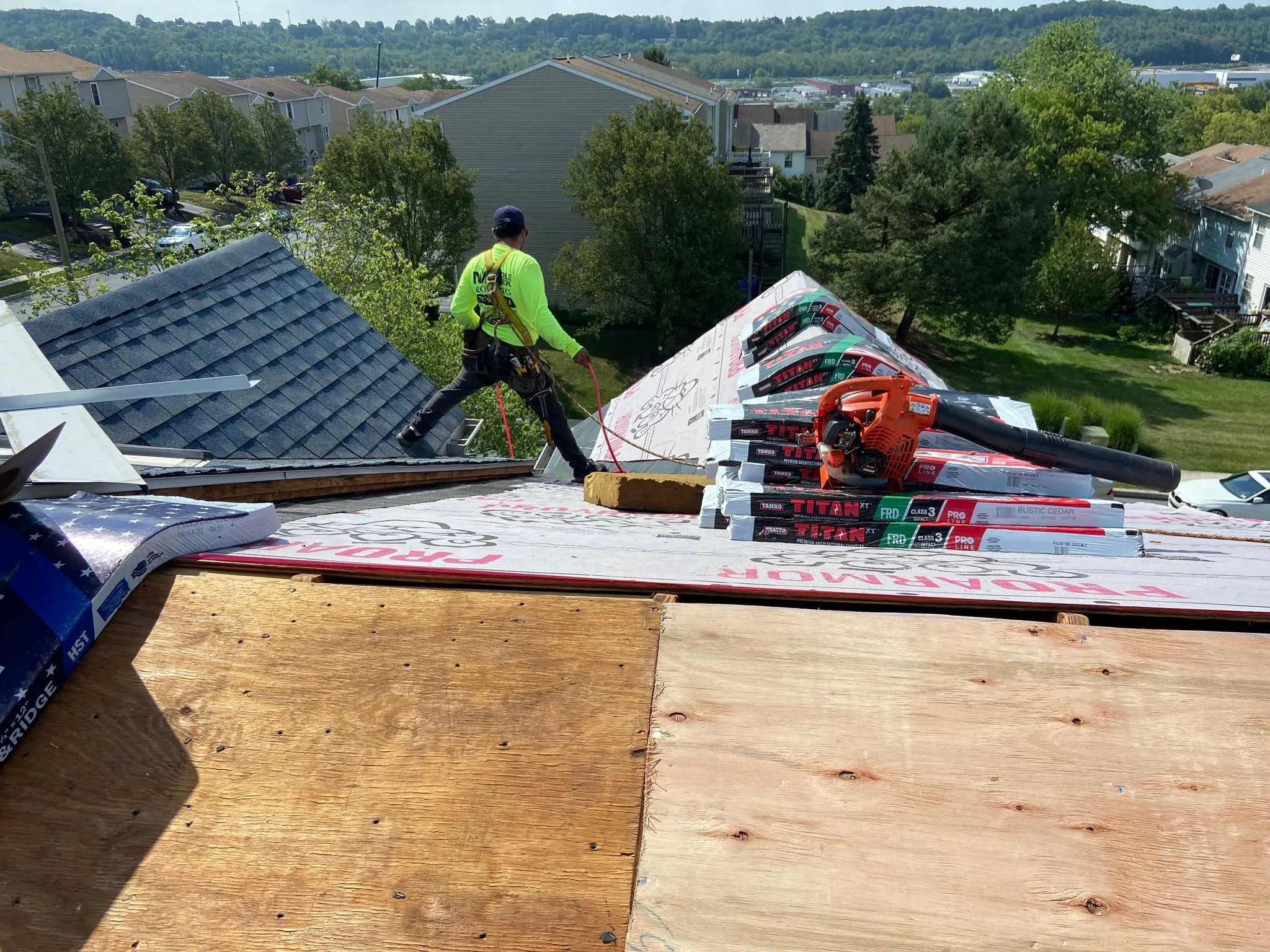Middle Creek Roofing working on a roof replacement project