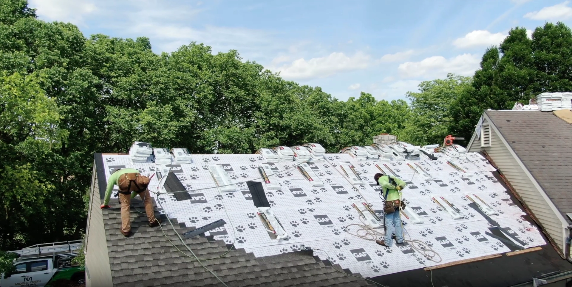 Middle creek roofers installing asphalt shingles