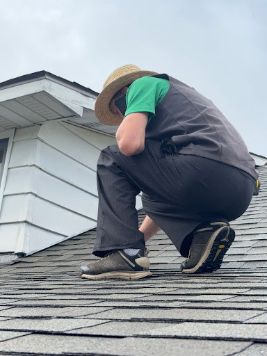 middle creek roofer inspecting a roof
