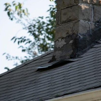 Damaged or Failing Flashing shown on residential roof